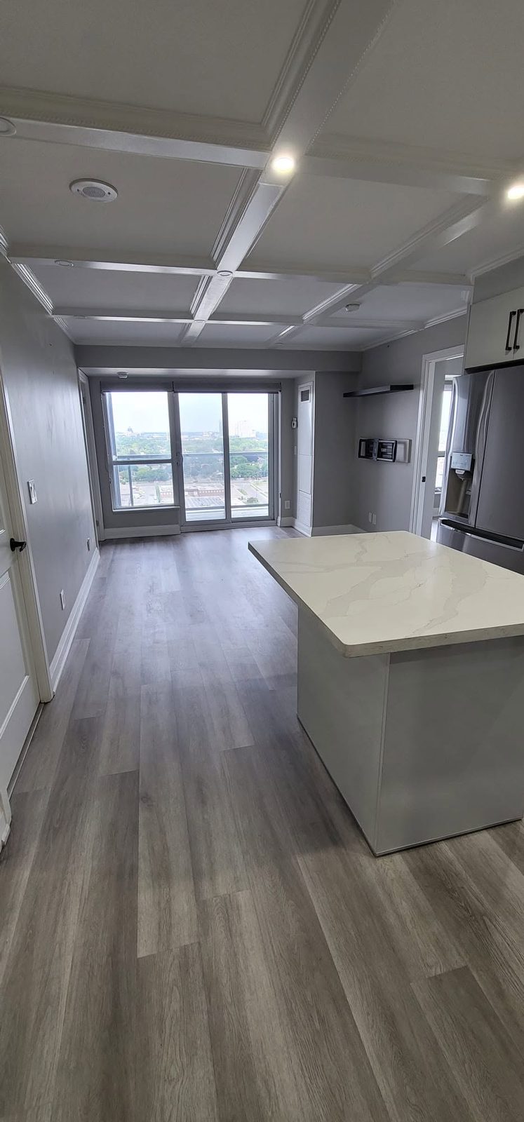 Condo kitchen island with city view