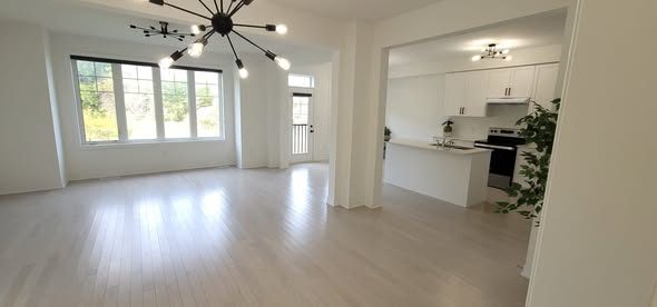An empty living room after a move-out clean